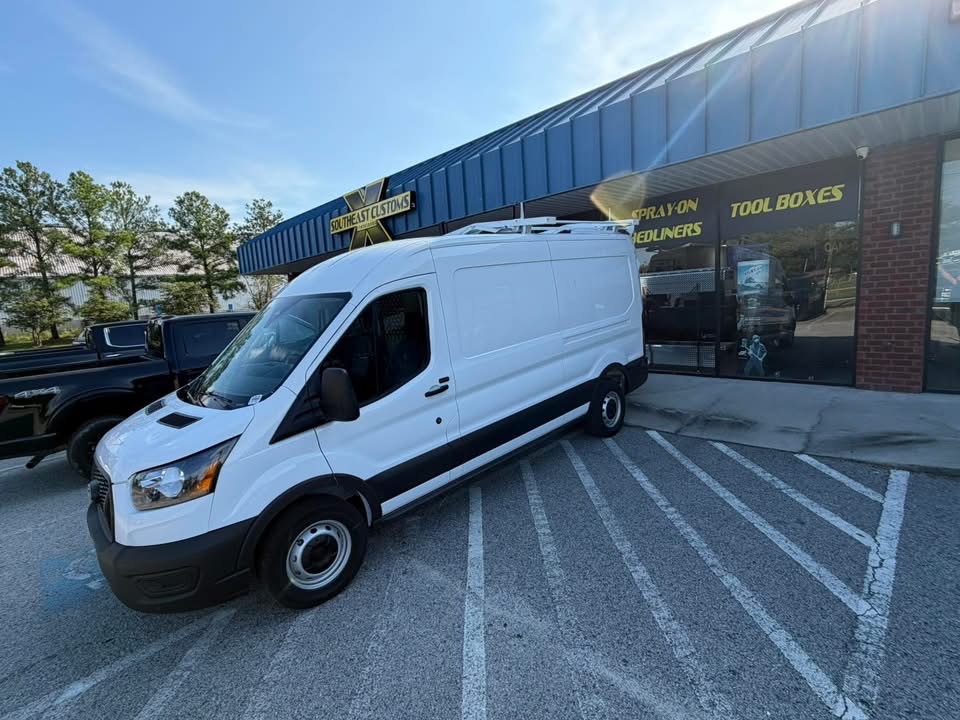 White commercial van outside Southeast Customs